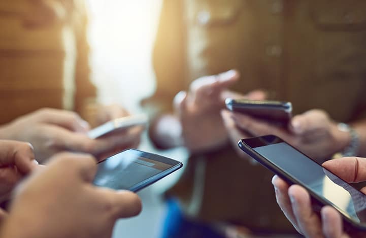 group-of-people-holding-mobile-phones